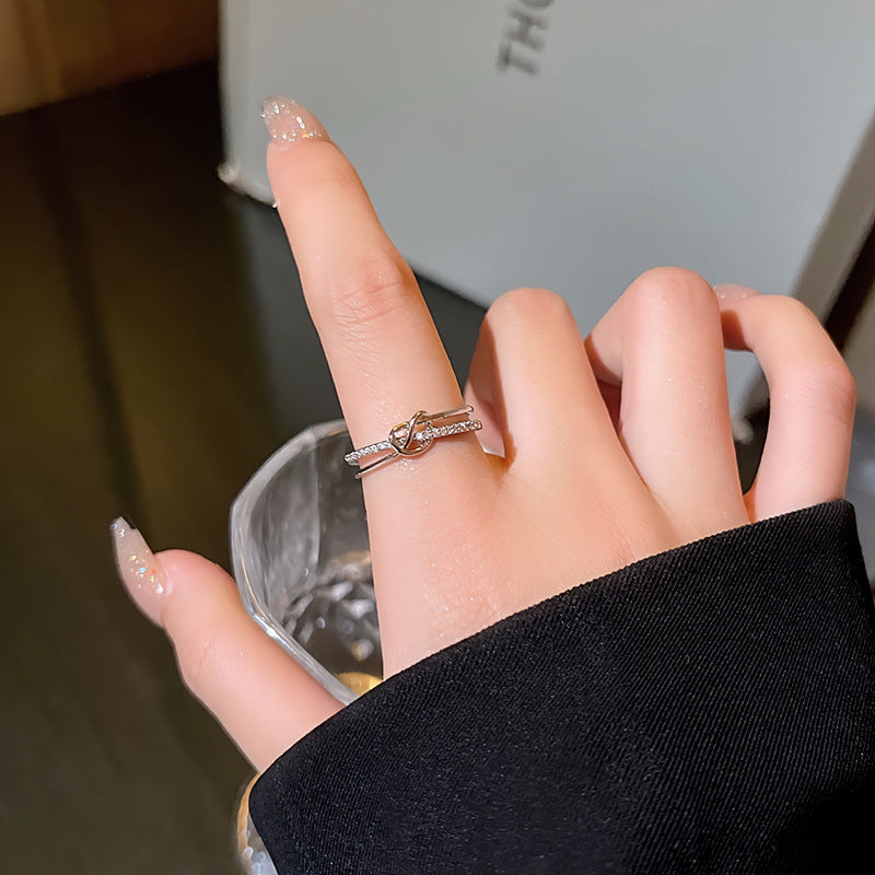 Winding Cross Ring with Micro Inlaid Zircon Design