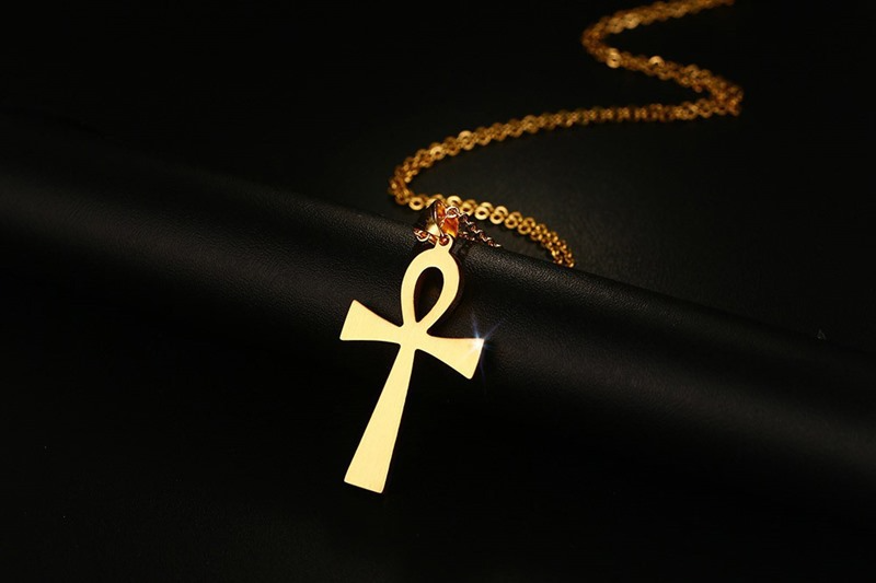 Gold and Steel Cross Pendant