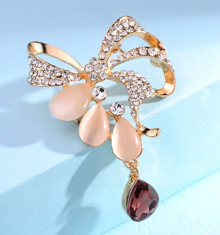 Fashion Bowknot Cat's Eye Brooch with Crystal Pin