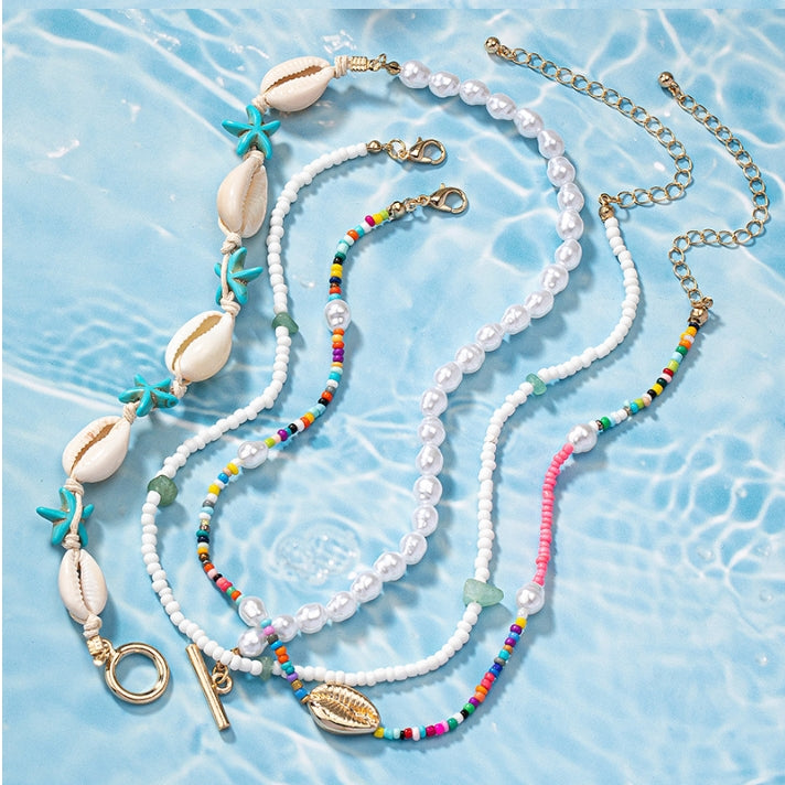 Fashionable Asymmetrical Shell Bead Cross Necklace