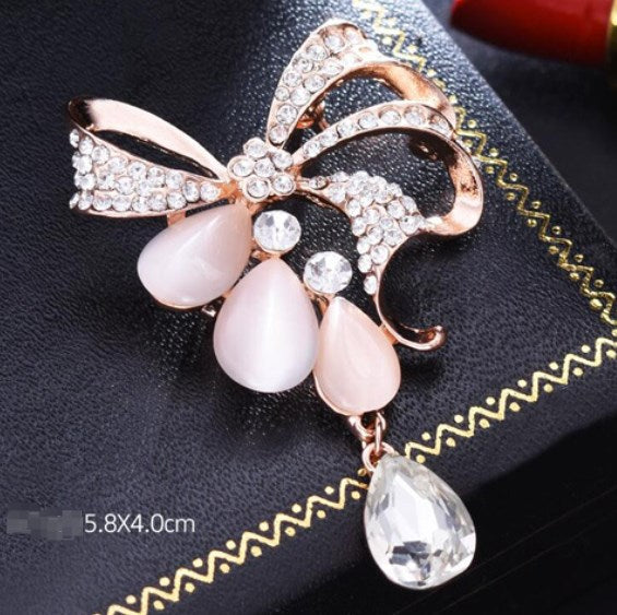 Fashion Bowknot Cat's Eye Brooch with Crystal Pin