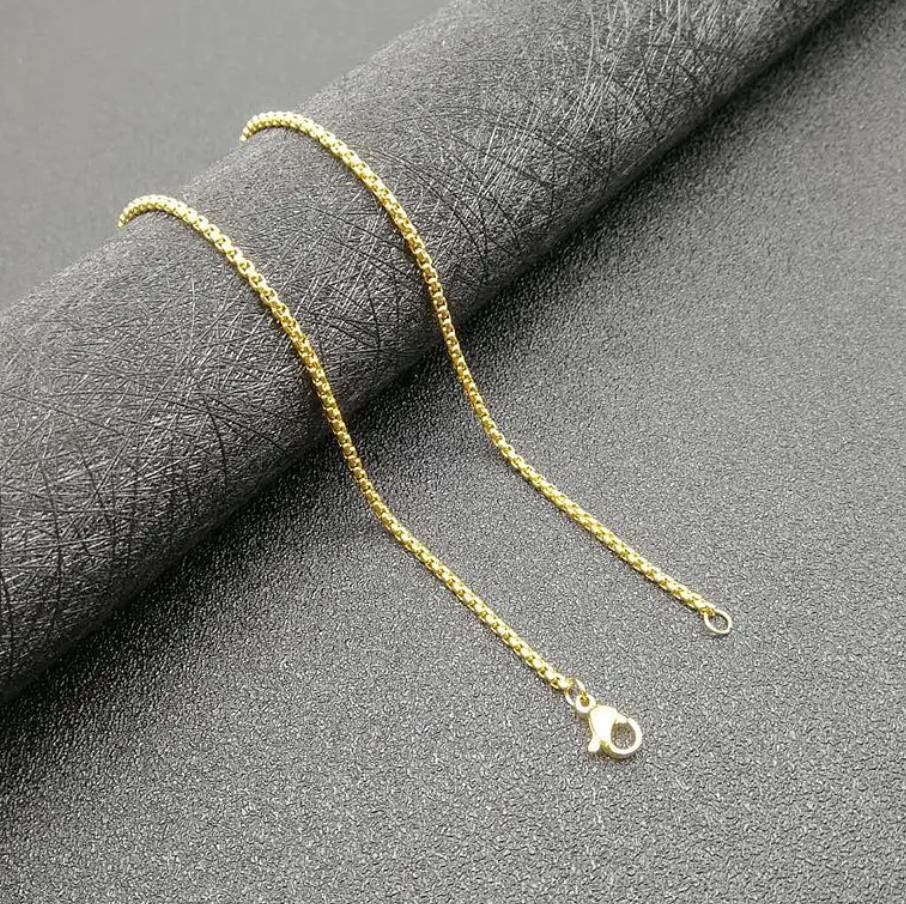 Gold Titanium Steel Crucifix Necklace