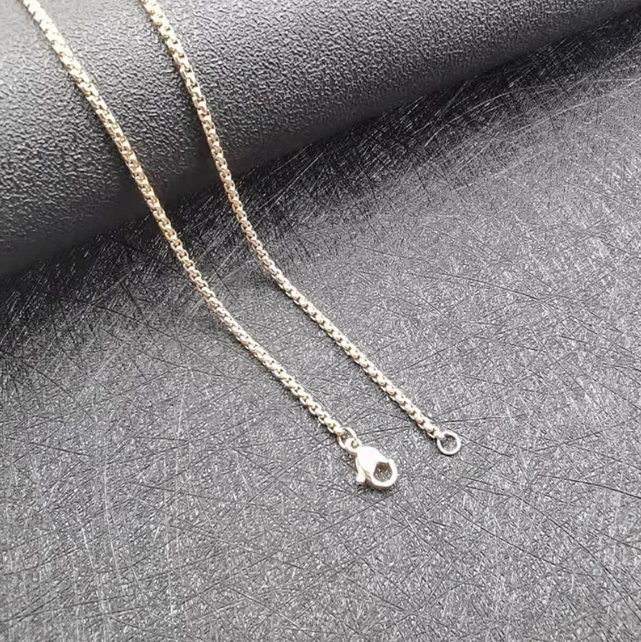Gold Titanium Steel Crucifix Necklace