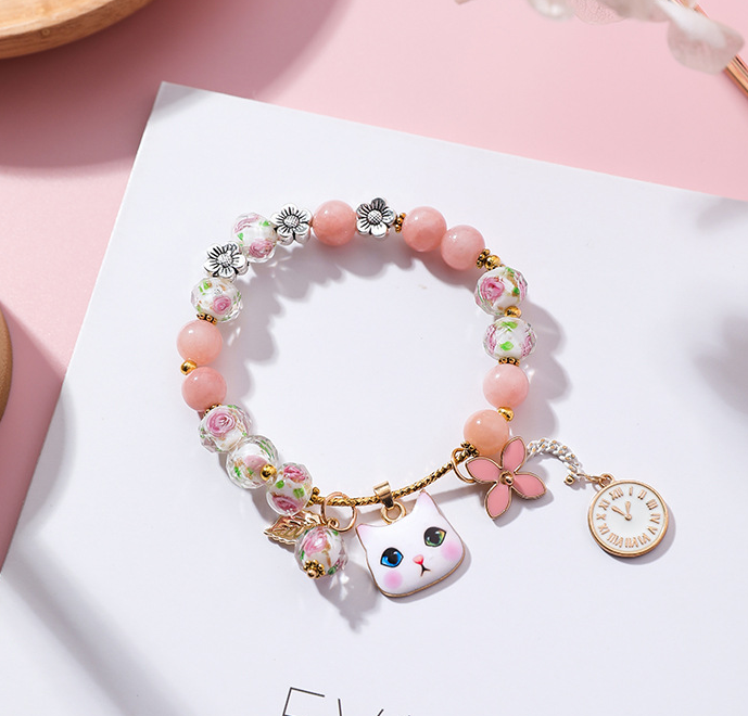 Multi-Layer Bracelet with Star, Moon, and Cat Eye Crystals