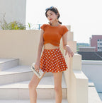 Women's Modest Short-Sleeve Top and Polka Dot Skirted Swimsuit